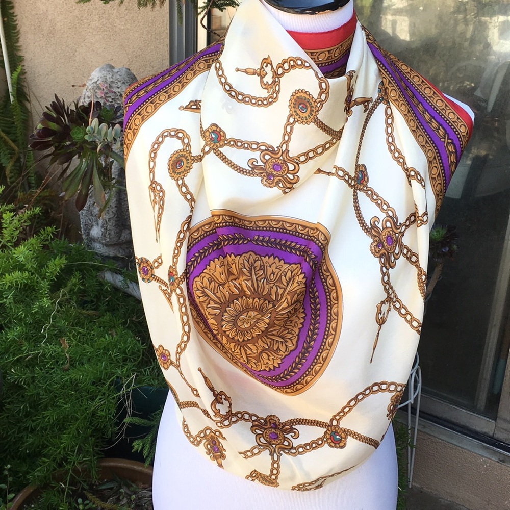 100% silk scarf. Chains and tassels